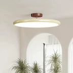 Médaillon Plafonnier LED Rond – disque crème dans une pièce avec miroir arrondi