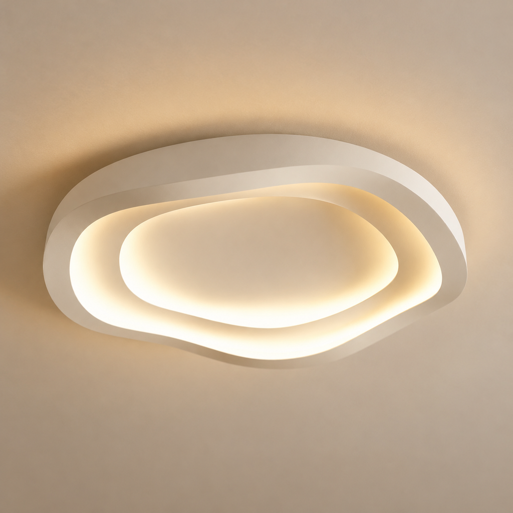 Récif Plafonnier LED Galet – plafonnier blanc en forme de galet allumé, vue de dessous