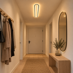 Piste Plafonnier LED Oblong – dans une entrée avec porte et miroir ovale