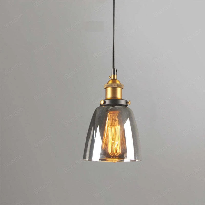 Calia Suspension Cloche en Verre, Douille Laiton – cloche en verre transparent sur fond gris