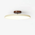 Médaillon Plafonnier LED Rond – disque crème avec tige argentée sur fond blanc