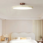 Médaillon Plafonnier LED Rond – dans une chambre aux voilages clairs