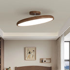 Médaillon Plafonnier LED Rond – disque à bord brun en bois dans une chambre