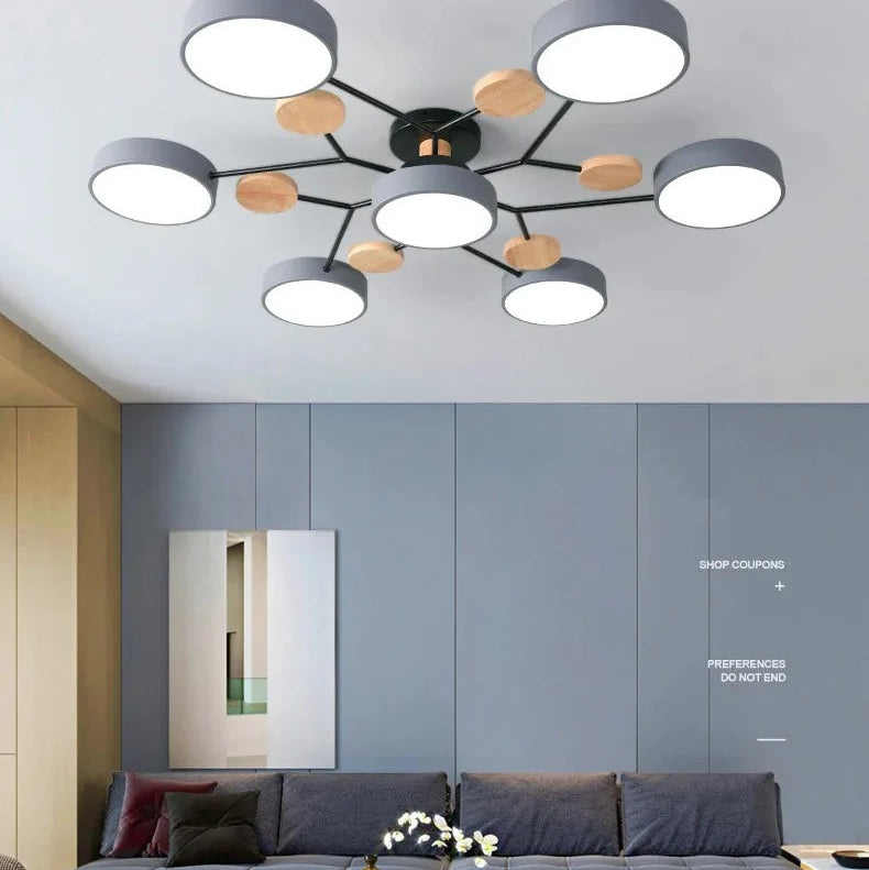 Orbes Plafonnier LED en Métal – disques blancs devant des placards bleu-gris