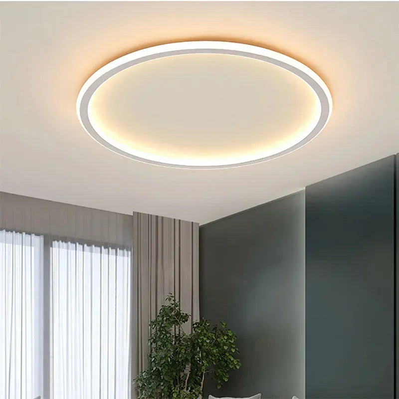 Halo Plafonnier LED Anneau – anneau LED dans une pièce avec rideau gris