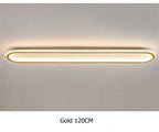 Piste Plafonnier LED Oblong – plafonnier doré allumé, lumière chaude, vue de face