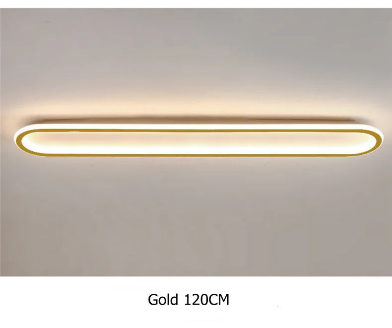 Piste Plafonnier LED Oblong – plafonnier doré allumé, lumière chaude, vue de face
