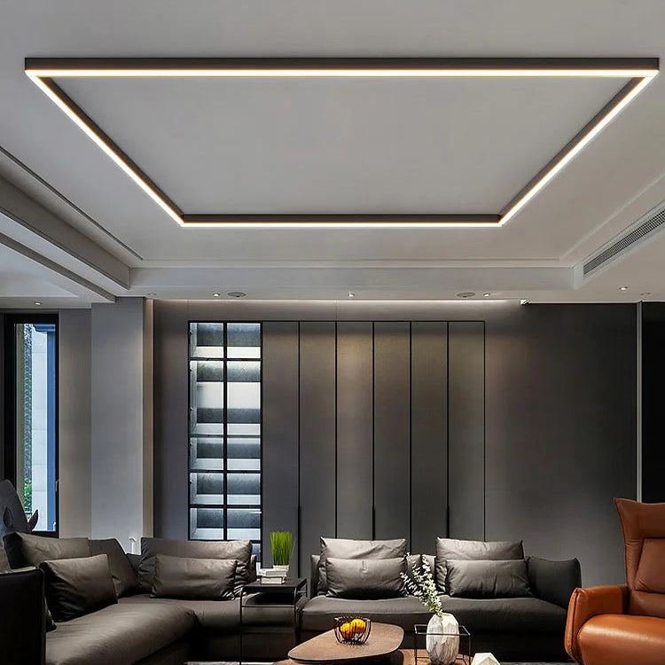 Rayon Plafonnier LED Linéaire – dans un salon aux panneaux muraux sombres