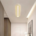 Piste Plafonnier LED Oblong – dans un couloir aux panneaux de bois