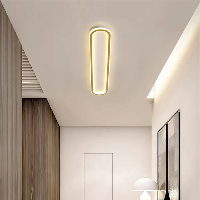 Piste Plafonnier LED Oblong – dans un couloir aux panneaux de bois