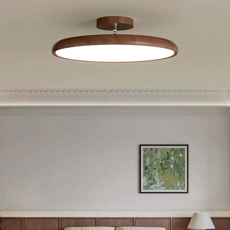 Médaillon Plafonnier LED Rond – disque crème au-dessus d'un tableau
