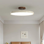 Médaillon Plafonnier LED Rond – disque à bord crème dans une chambre