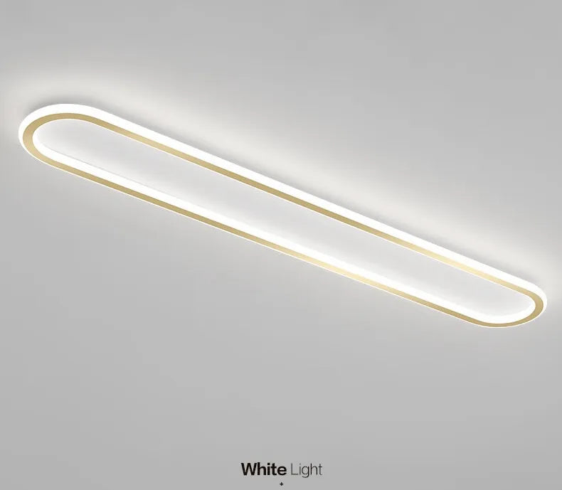 Piste Plafonnier LED Oblong – plafonnier blanc à liseré doré, vue en perspective