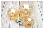 Ampoule à Filament Spirale – ampoules globes à filament posées sur une table en bois clair