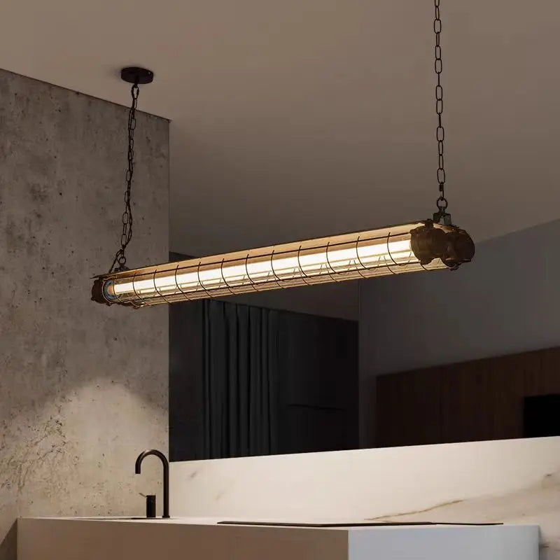 Tubia Suspension Tube en Verre Style Industriel – tube suspendu dans une pièce en béton