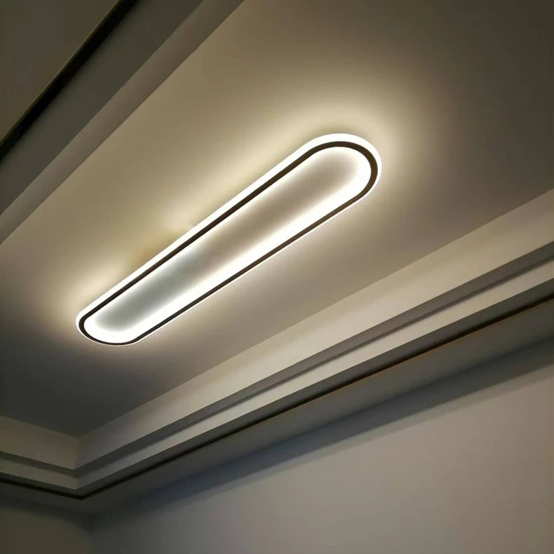 Piste Plafonnier LED Oblong – plafonnier oblong noir dans une pièce grise