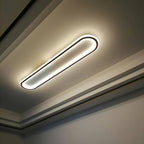 Piste Plafonnier LED Oblong – plafonnier oblong noir dans une pièce grise