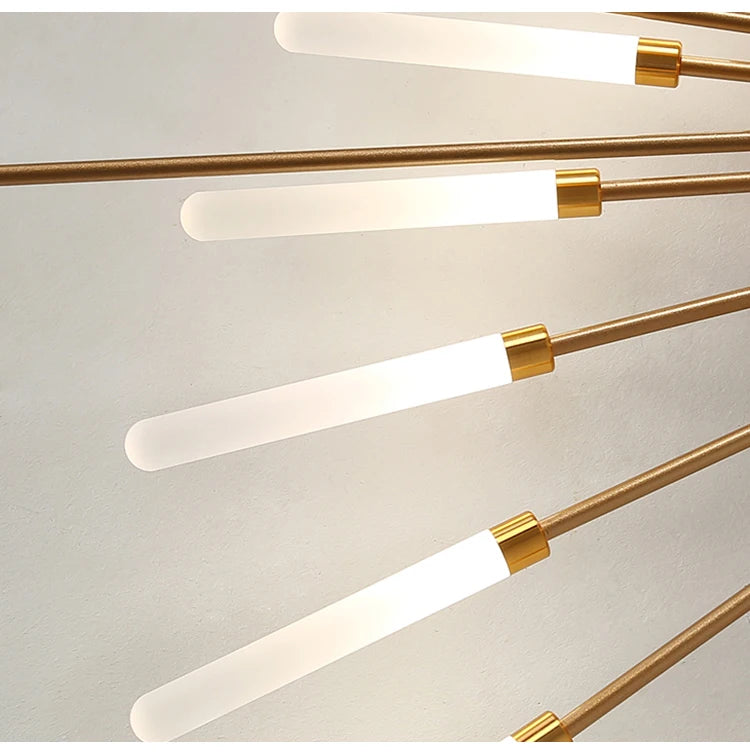 Éclat Plafonnier LED Étoilé – gros plan de deux tubes lumineux et de leurs bagues dorées
