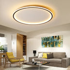 Halo Plafonnier LED Anneau – au plafond d'un salon avec tableau coloré