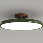 Médaillon Plafonnier LED Rond – gros plan du disque vert et de sa fixation brune