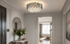 Fumia Plafonnier en Cristal et Verre Fumé – dans une entrée avec miroir rond et console
