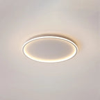 Halo Plafonnier LED Anneau – anneau LED noir allumé sur fond beige