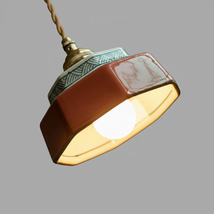 Hexa Suspension en Céramique – vue de dessous de l'abat-jour terracotta allumé